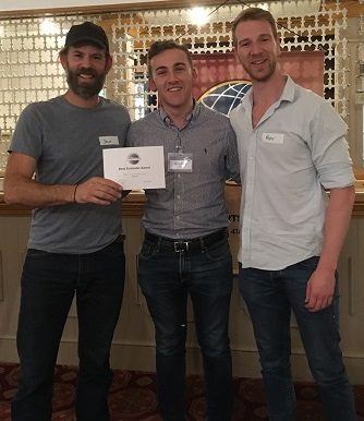 Photo shows Dan Winterbourne receiving his aware for best evaluator, together with Bradley Peters, our President and Peter, our star guest of the night.